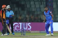 Rahul Tewatia (right) in action against SRH